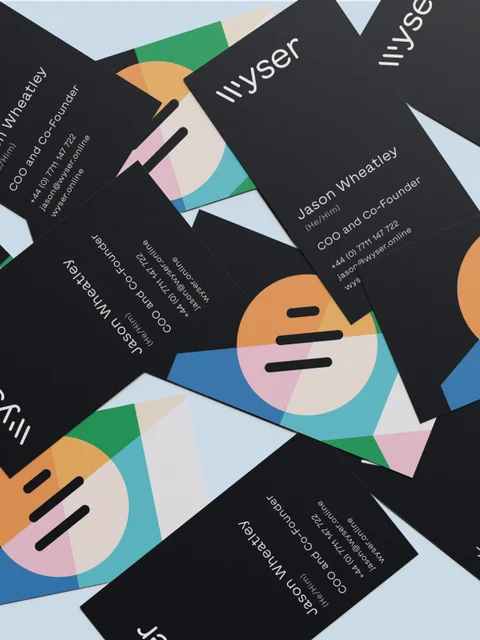 Multiple business cards with Wyser's new brand logo