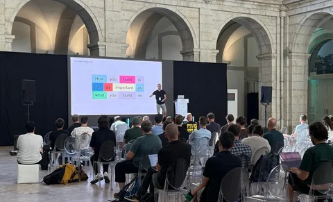 Dan on stage at dot All 2025